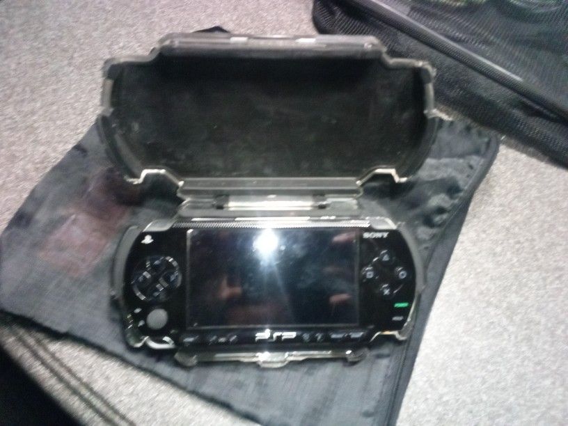 Sony PSP 1000 With Logitech Case And One Game