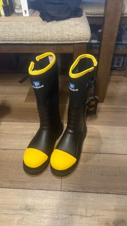 Trudave tall waterproof work boots, featuring distinctive bright yellow steel toe caps