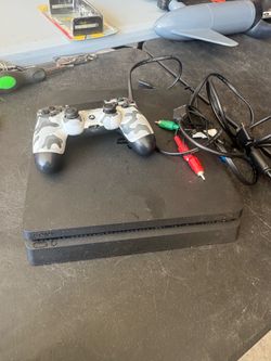 PS4 video game with controller and power supply