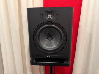 Focal Alpha 80 Evo speakers with stands.