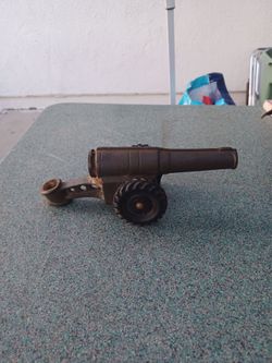 Vintage cast iron toy cannon