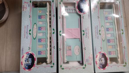 Precious Moments train set with 3 extra cars