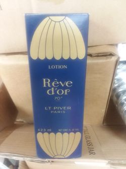 Large Bottle of Reve D'or Perfume
