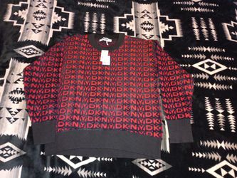 DKNY SIZE M WOMANS SWEATER .