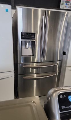 GE Side By Side Stainless Steel Fridge
