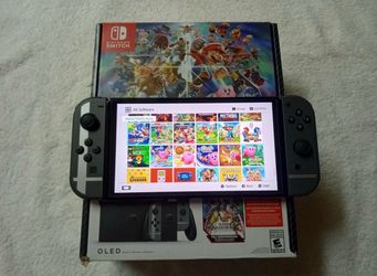 NINTENDO SWITCH OLED with 100 POPULAR SWITCH GAMES INSTALLED