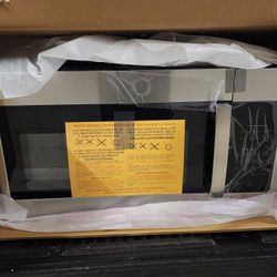 New GE® 1.6 Cu. Ft. Over-the-Range Microwave Oven still in original box