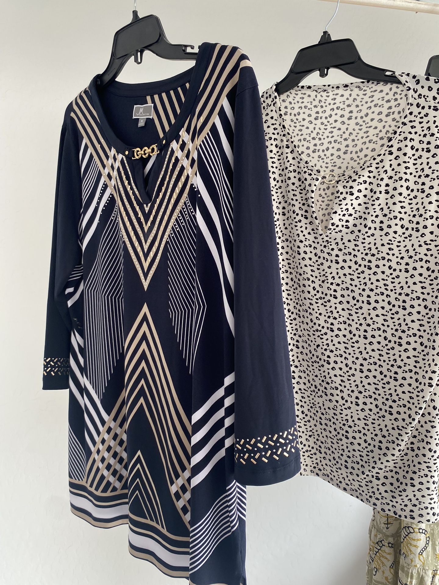 Women’s dresses, blouses, shoes, and purses