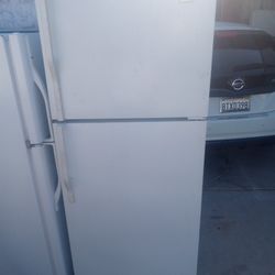 Working White Whirlpool Apartment-size Refrigerator 