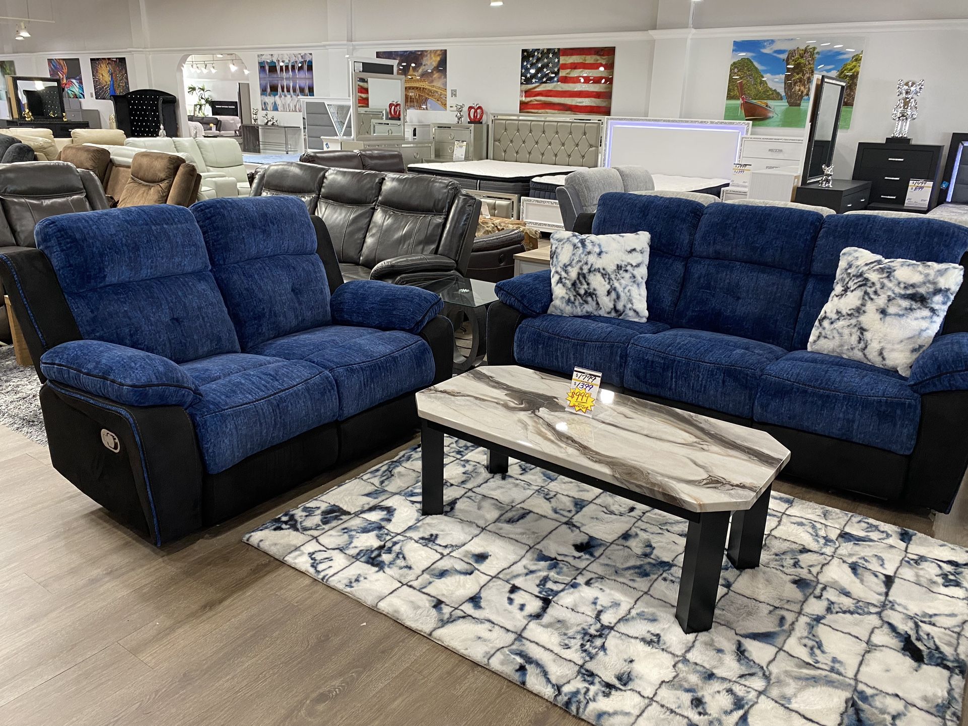 Sofa and loveseat set with four recliners