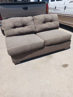 Free outdoor  L shaped couch/garage couch