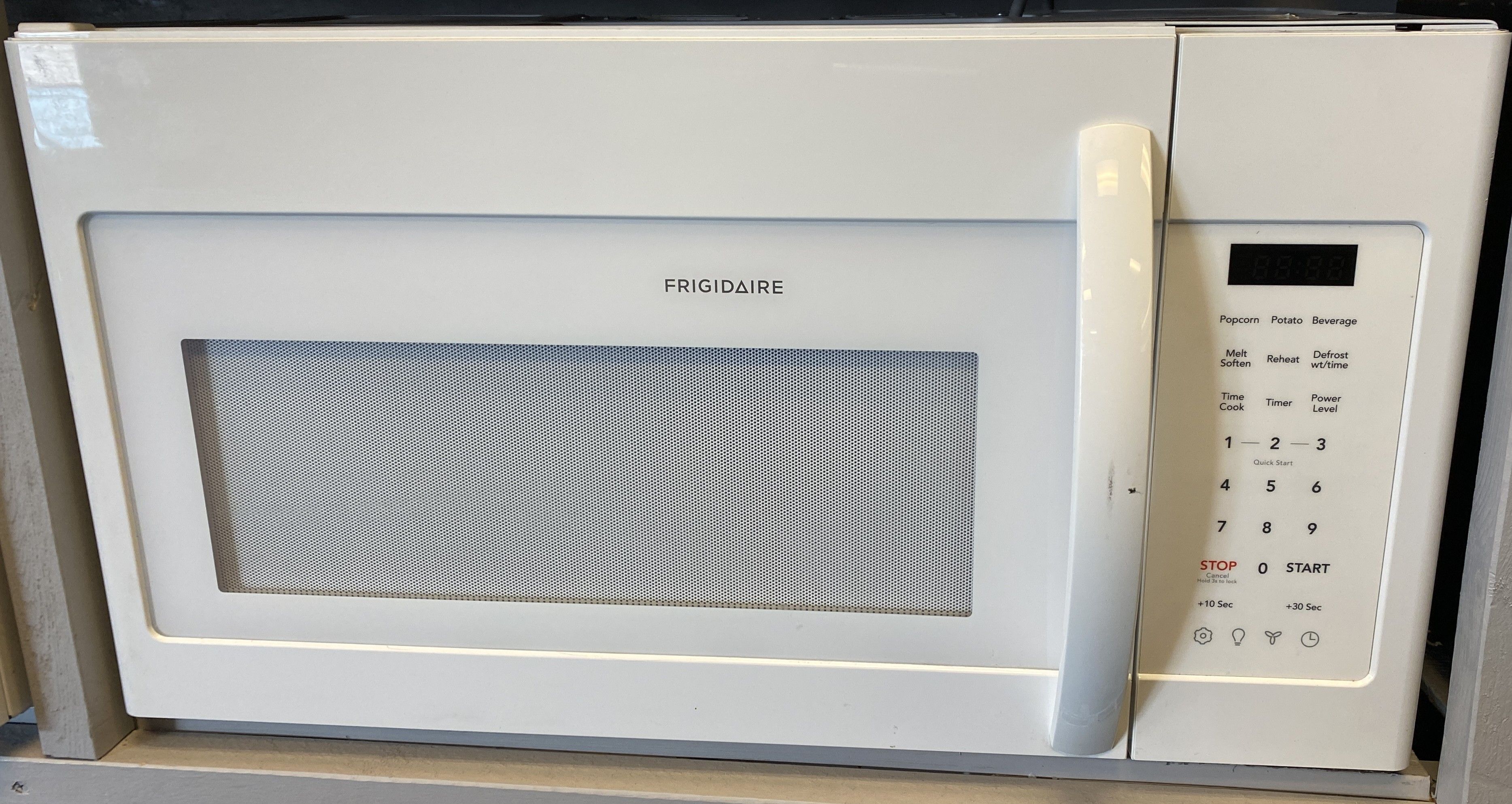 Bisque Frigidaire Over The Range Microwave (8-0021)