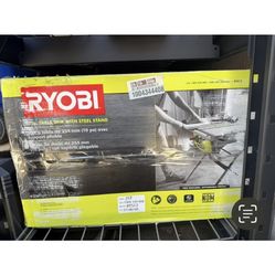The image shows a boxed Ryobi 10-inch table saw with a steel stand, model RTS12,