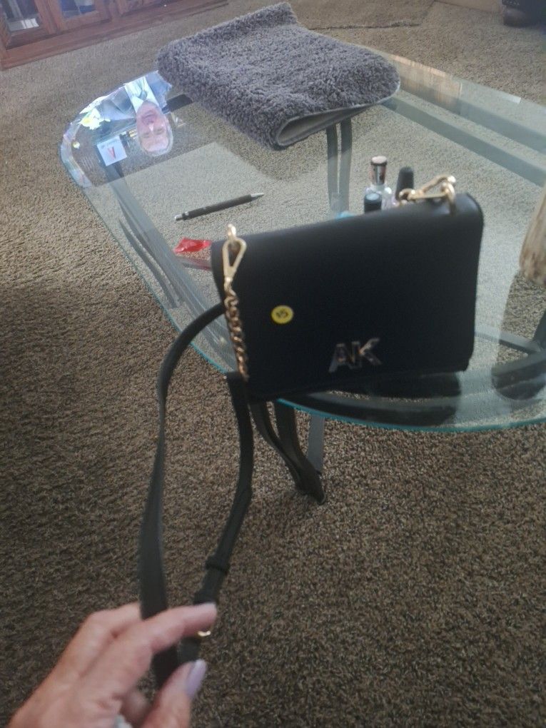New AK BRAND PURSE OVER THE SHOULDER STRAP . YOU CAN ADJUST STRAP. GOOD CHRISTMAS GIFT FOR DOLLARS