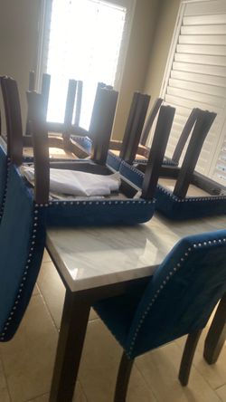 Dining room table and living room