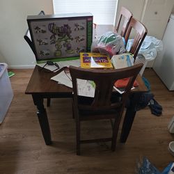 New kitchen table with two new chairs and three very good chairs