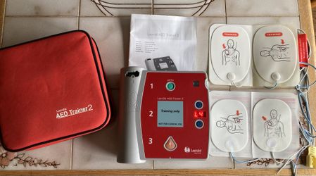 Laerdal AED Trainer with 2 Sets of Reusable Adult Pads