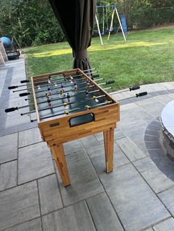 Foosball table turns into more handles like pool