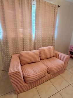 Pink Memory Foam Love Seat With Pink & White Sheer Curtains