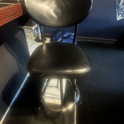 $20 Two Black Bar Stools And One White Bar Stool 