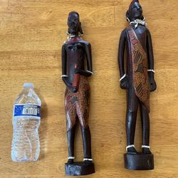 African Wooden Statues - Vintage Large Exotic Wooden Hand Carved Beaded Couple Figurines at 27” & 29” Tall. In Very Good Condition !!