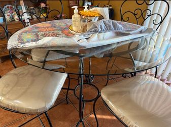 Wrought iron glass table and 4 chairs