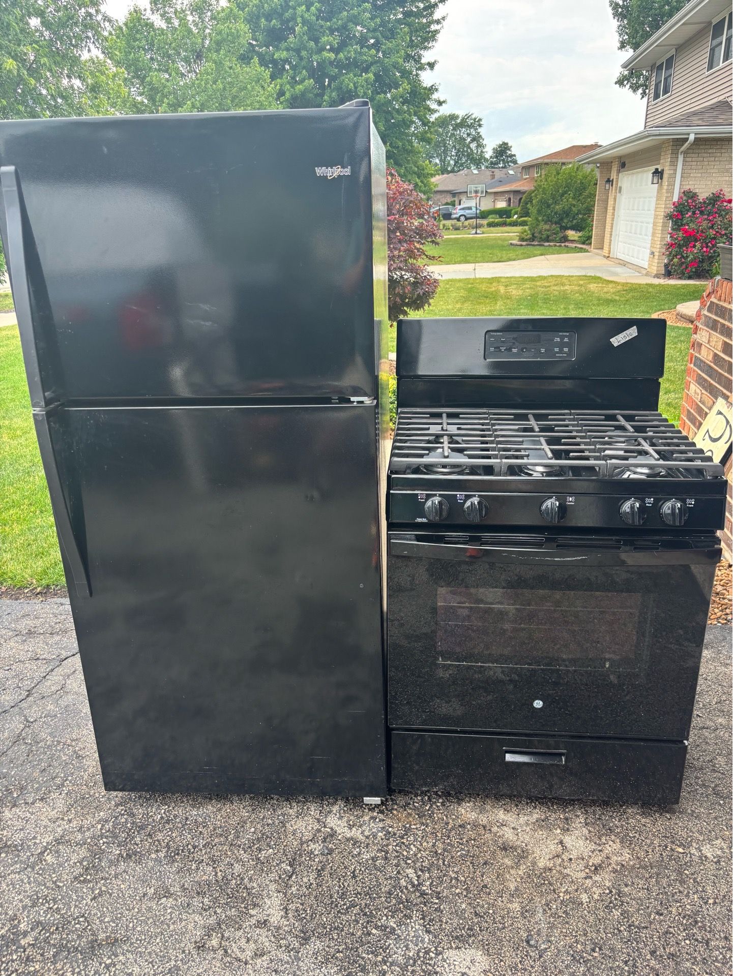 Whirlpool refrigerator and GE gas stove