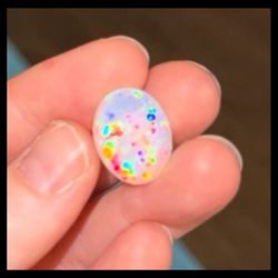 floral harlequin opal cabochon