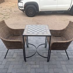 Outdoor chess table and two chairs