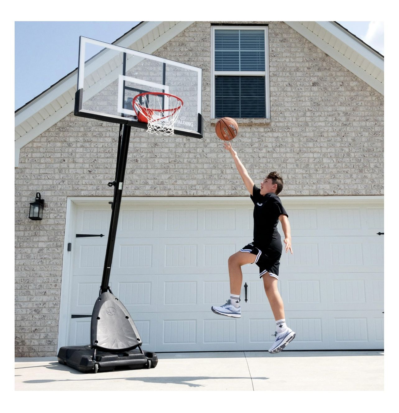 Spalding 54 In. Shatter-proof Polycarbonate Exacta height® Portable Basketball Hoop System