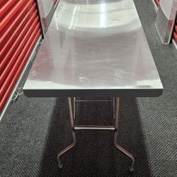 Regency 24"x 60" x 31" 18-Gauge Stainless Steel Open Base Folding Work Table