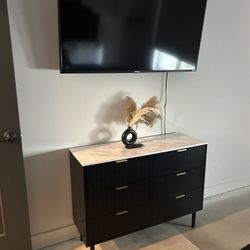 TV and Marble top TV stand
