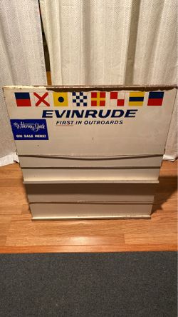Evinrude outboard motor tin display stand