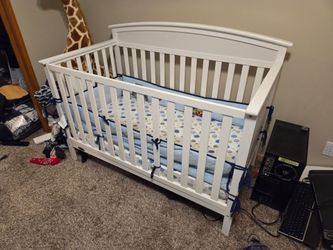 White Wooden Crib with Matress.