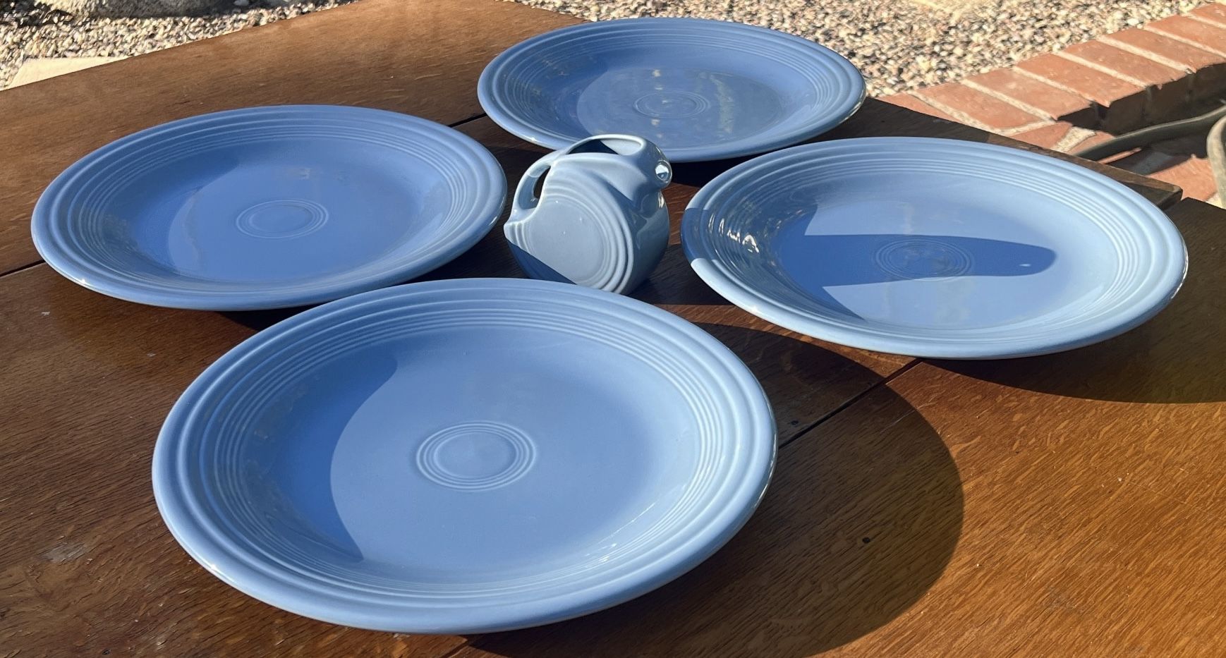 4 PERIWINKLE BLUE FIESTA WARE PLATES WITH MATCHING CREAM PITCHER! LOOK!