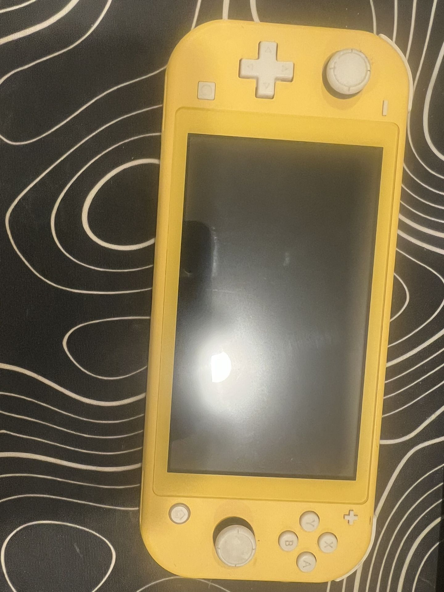 Nintendo Switch Lite (Comes with Super Smash Bros)