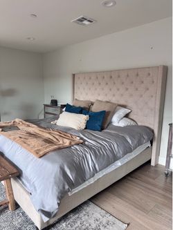 Beautiful neutral tufted king size bed