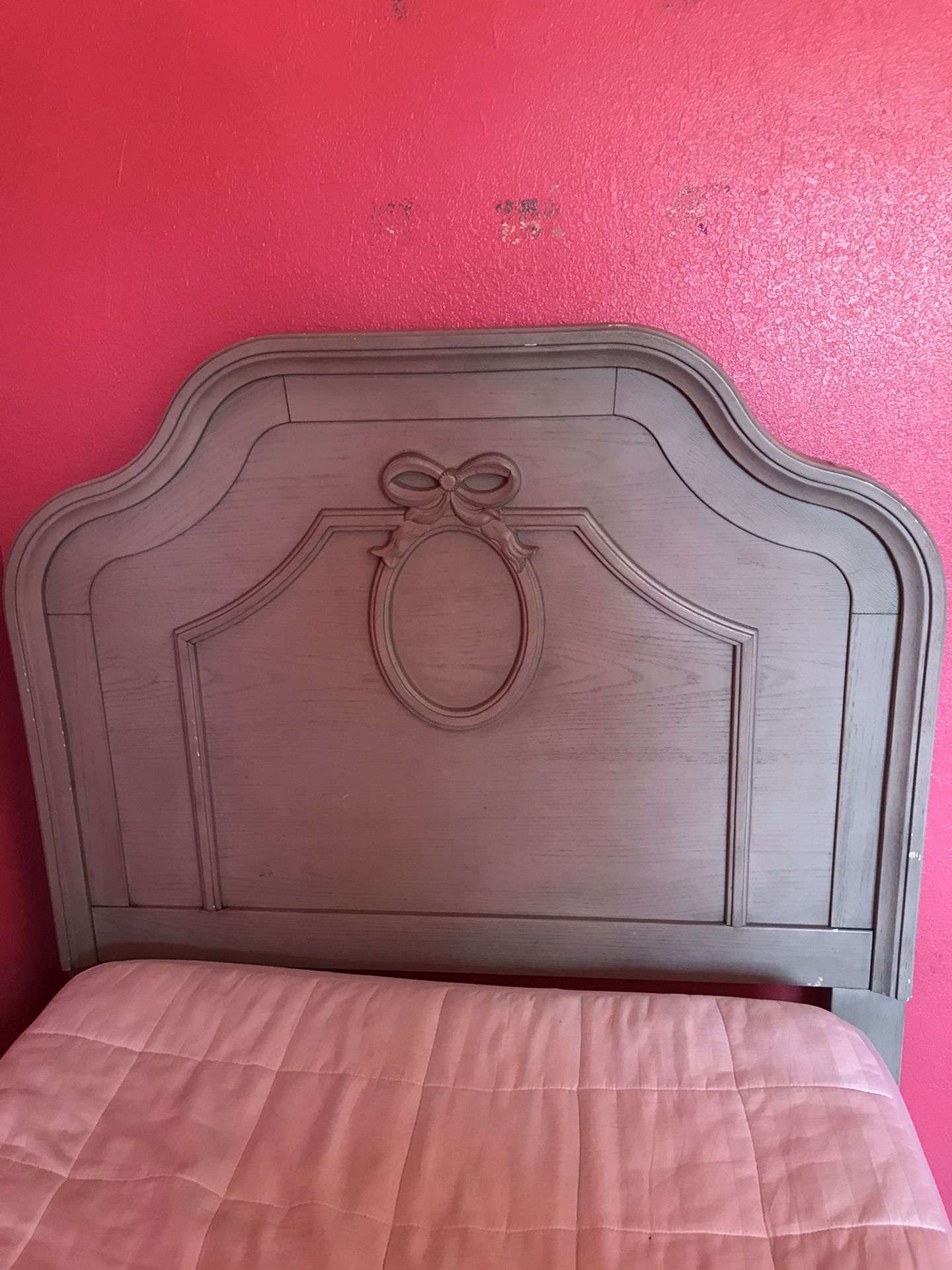 Twin bed frame with decorations