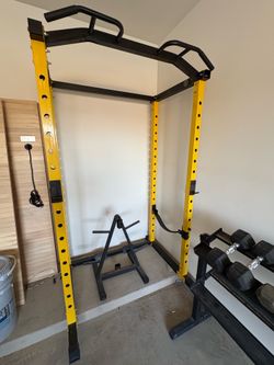 Weight lifting cage