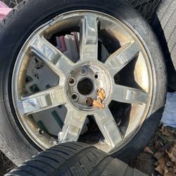 285/45/22 Factory Cadillac Rims W/ Tires 