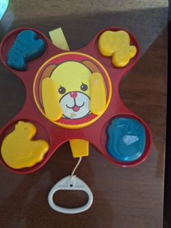 1980s Battat or Tomy musical crib toy features a rotating puppy character