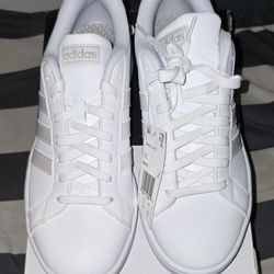 Adidas 9.5 WOMEN  BRAND NEW WITH BOX