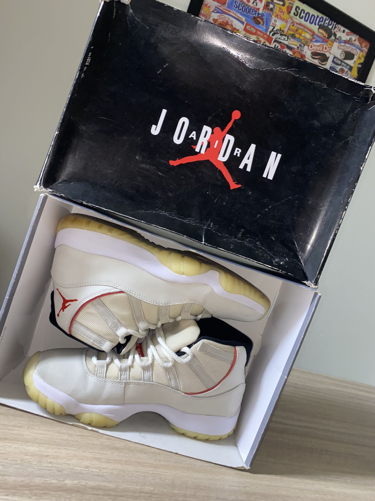 Jordan 11s Retro Platinum Tint/University Red