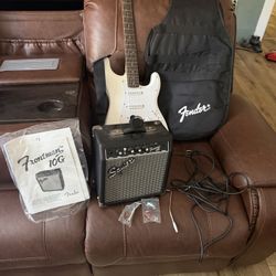 Electric Guitar w/ amp & accessories 