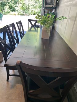1. Solid Wood Dining Table Set with 8 Leather Chairs