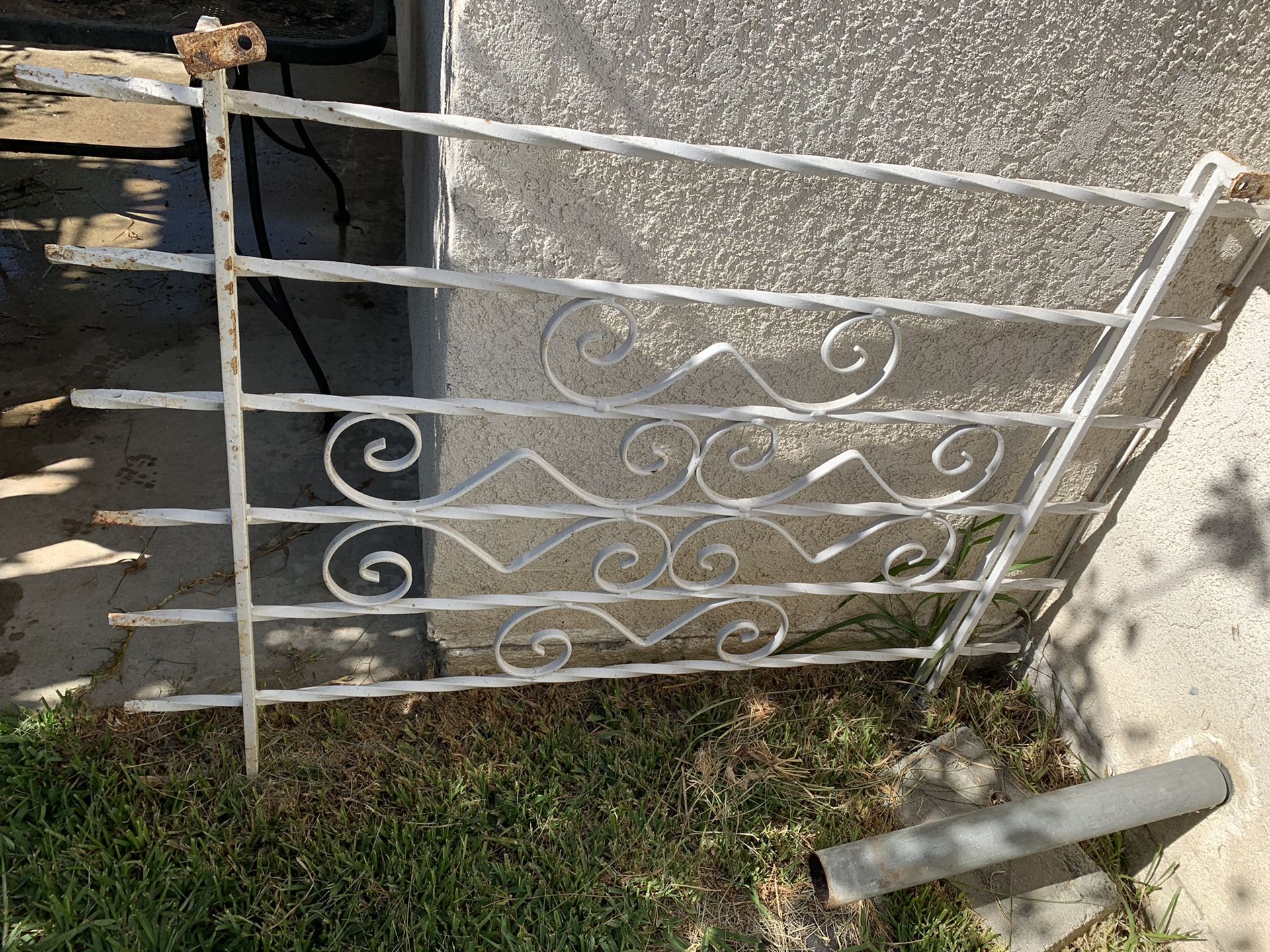 Metal fence for window?