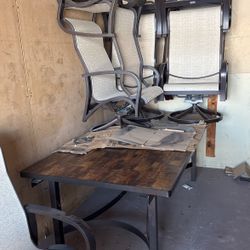 Table And Swivel Chairs 