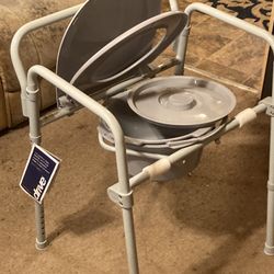 Folding Bedside Commode/Toilet By Drive