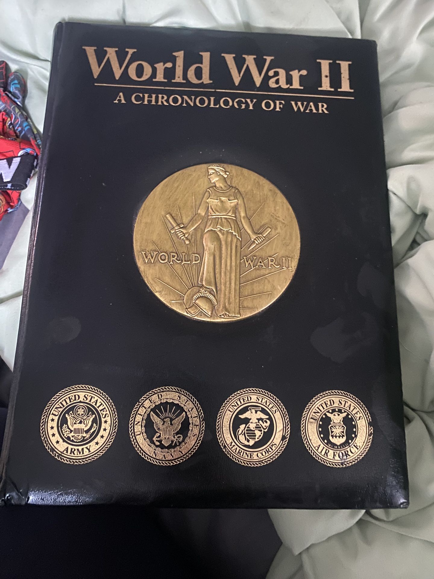 World War II: A Chronology of War", authored by Colonel Raymond K. Bluhm Hardcover Book