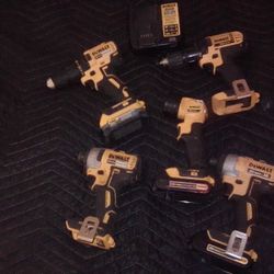 20 V Cordless DeWalt 2 drills 2  1/4 Impacts  Flashlight , Three Batteries And Charger.             s